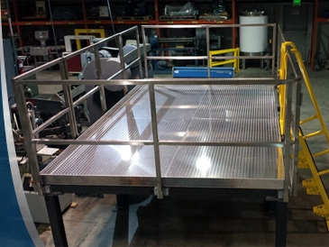 Steel equipment access platform inside an industrial plant