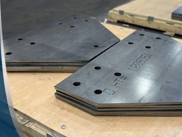 Steel plate being cut and fabricated